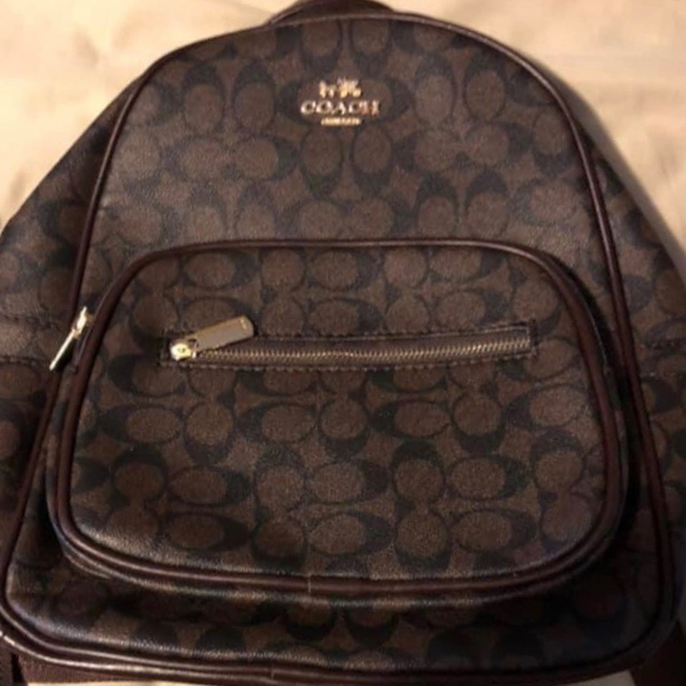 Brown Coach bag.